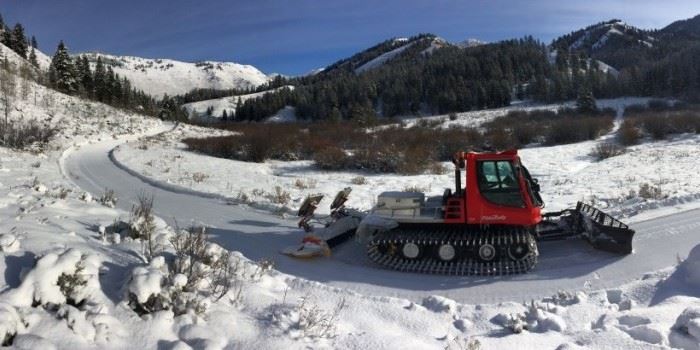 Snow Machine Grooming a Trail