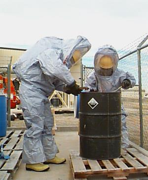 Two men in hazard material suits.